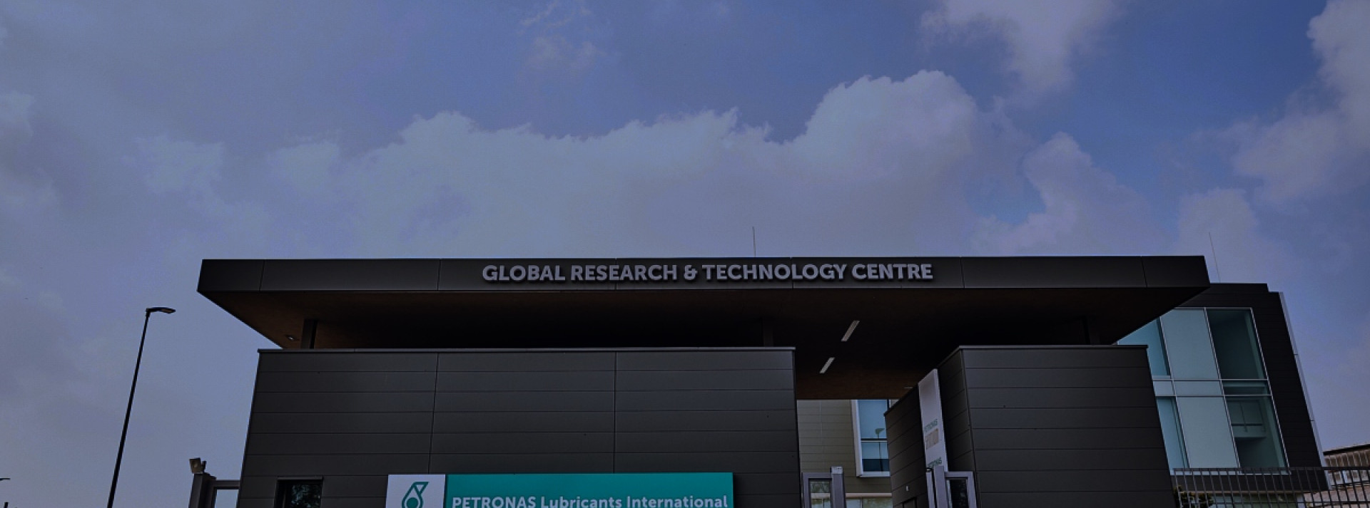 Darkened PETRONAS Global Research & Technology Centre di Santena